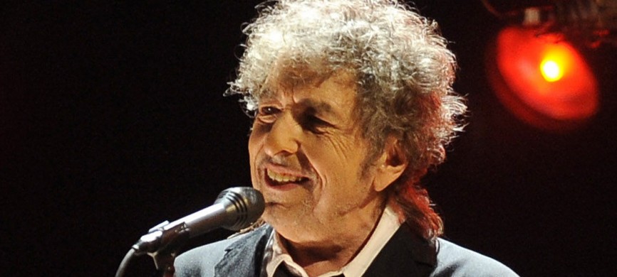<p>FILE - In this Jan. 12, 2012 file photo, Bob Dylan performs in Los Angeles. Fifty years into his career as a recording artist and a week away from release of an extraordinary new CD, Dylan spent his Tuesday evening where he seems to feel most comfortable � on a stage. (AP Photo/Chris Pizzello, File) NYTCREDIT: Chris Pizzello/Associated Press</p>