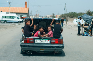 <p>Children sit in a car trunk, amid the ongoing conflict between Israel and Hamas, in Rafah, in the southern Gaza Strip, April 24, 2024. REUTERS/Mohammed Salem</p>