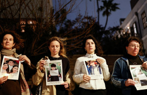 <p>Activists stand with pictures of children killed in Israel, Palestine, Iran and Lebanon, in a silent vigil calling for an end to the ongoing U.S.-Israeli conflict with Iran, in Tel Aviv, Israel, March 19, 2026. REUTERS/Amir Cohen</p>