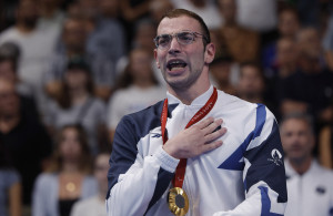 <p>Paris 2024 Paralympics - Men's 200m Freestyle - S4 Medal Ceremony - Paris La Defense Arena, Nanterre, France - September 3, 2024 Gold medallist Ami Omer Dadaon of Israel celebrates on the podium REUTERS/Andrew Couldridge</p>