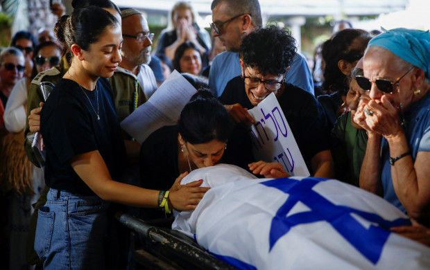 <p>Mourners pay respects to Eden Yerushalmi, a hostage whose body was retrieved from Gazan captivity and brought to Israel along with those of five others, after she was kidnapped during the deadly October 7 attack on Israel by Hamas, at her funeral in Petach Tikva, Israel, September 1, 2024. REUTERS/Shir Torem</p>