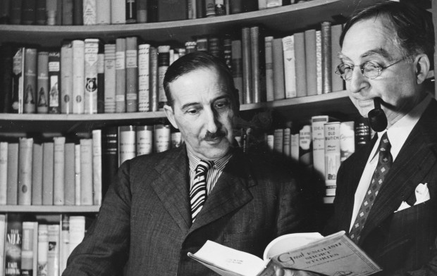 <p>Austrian novelist Stefan Zweig in conversation with his publisher W Huebsch of the Viking Publishing Company, circa 1930. (Photo by Three Lions/Hulton Archive/Getty Images)</p>