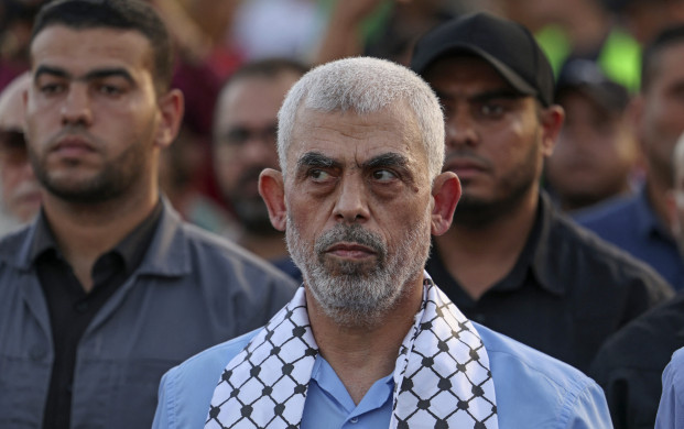 <p>Head of the political wing of the Palestinian Hamas movement in the Gaza Strip Yahya Sinwar attends a rally in support of Jerusalem's al-Aqsa mosque in Gaza City on October 1, 2022. (Photo by MAHMUD HAMS / AFP)</p>