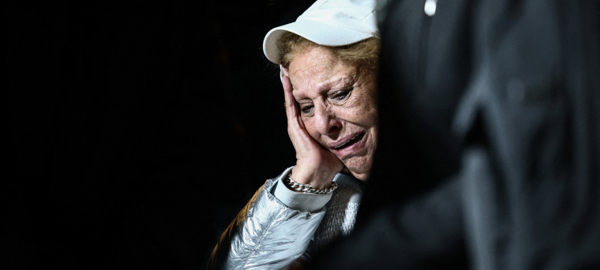 <p>A woman mourns during the funeral of brother Yaakov and sisters Sara and Avigail Biton who were killed in an Iranian missile strike on Sunday, amid the U.S.-Israel conflict with Iran, in a cemetery in Jerusalem March 2, 2026. REUTERS/Jamal Awad</p>