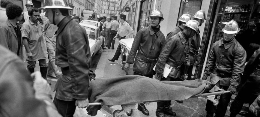 <p>(FILES) In this file photo taken on August 9, 1982, firemen and a rescuers evacuate a body after the French-Jewish delicatessen restaurant Jo Goldenberg was attacked on rue des Rosiers in Paris by gunmen who threw a grenade into the establishement and shot at customers with sub-machine guns, killing six and injuring 22 others. - The August 9, 1982 attack is attributed to Abu Nidal Organisation - Fatah Revolutionary Council (Fatah-RC), a Palestinian group dissident from the Palestine Liberation Organisation (PLO). (Photo by MICHEL CLEMENT / AFP)</p>
